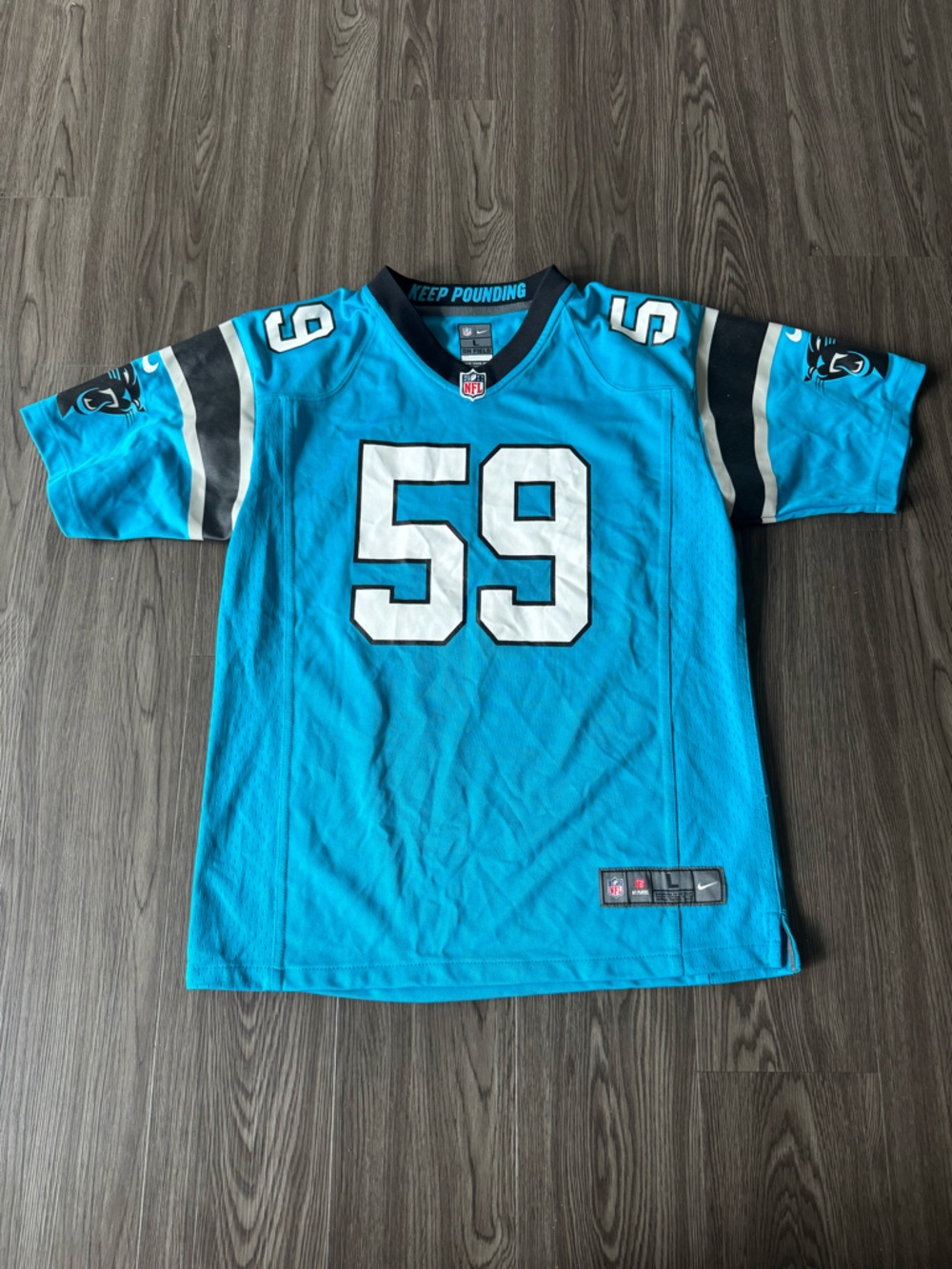 Nike Teal Carolina Panthers NFL Football Jersey with Black and White Accents